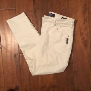 White capris, silver brand